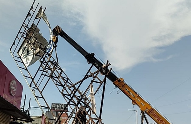 PMRDA Cracks Down on Illegal Hoardings in Haveli, Bhor; Two Massive Structures Demolished