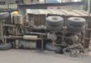 Stone-Laden Hyva Truck Overturns in Pimpri; Two-Wheeler Damaged, No Casualties