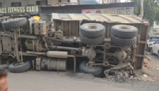 Stone-Laden Hyva Truck Overturns in Pimpri; Two-Wheeler Damaged, No Casualties